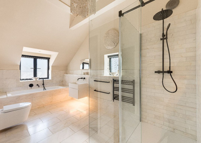 Bathroom (Shower and bath) at Contemporary 16th Century Black And White House For Filming, West Sussex