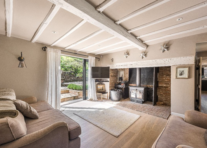 Livingroom, Fireplace at Contemporary 16th Century Black And White House For Filming, West Sussex